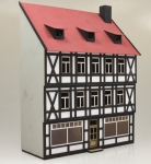 Die Modellbahnwerkstatt 1936 - 0 - Halbrelief Harzer Stadt-Fachwerkhaus mit Ladenlokal, dreistöckig